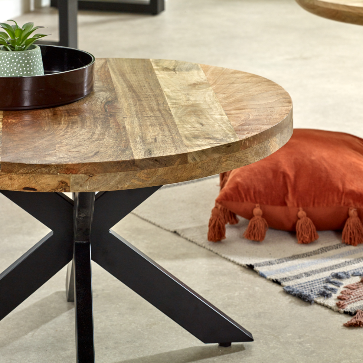 Solid wood Surrey coffee table with metal spider legs, modern home accent piece for living room or seating area.