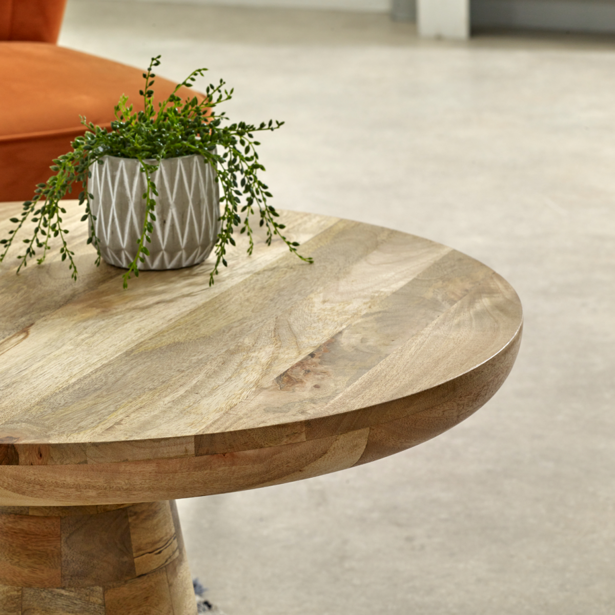Solid wood Surrey mushroom coffee table by InStock with a rounded, natural finish, ideal for modern living room décor.