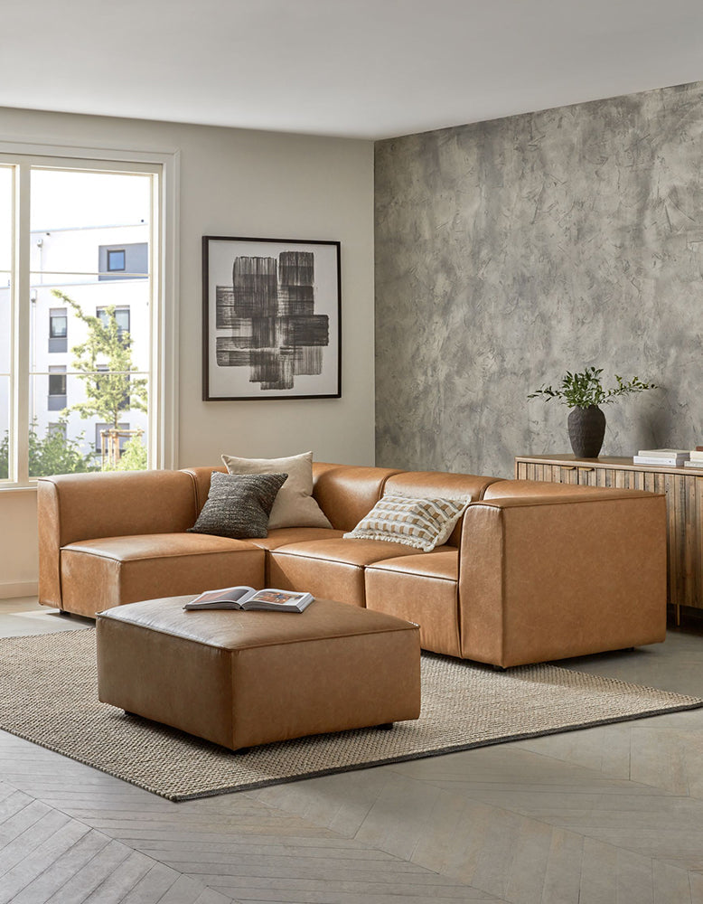 DC Concept Van Dyke Modular Sofa three-seater corner sofa with plush fabric and modern design, shown in a spacious living room setting.
