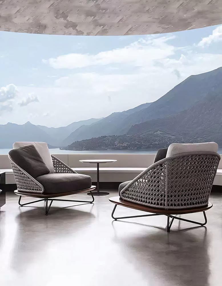 DC Concept Zarina outdoor sofa set with garden armchair, featuring weather-resistant cushions and stylish outdoor furniture design.