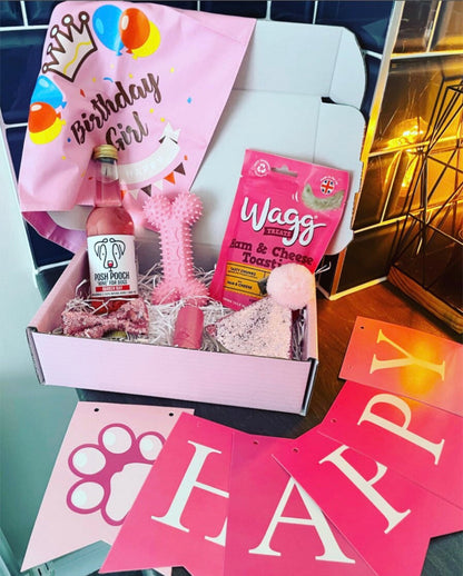 Birthday Girl dog hamper by The Bonnie Hound with treats, toys, and festive accessories for celebrating dogs.