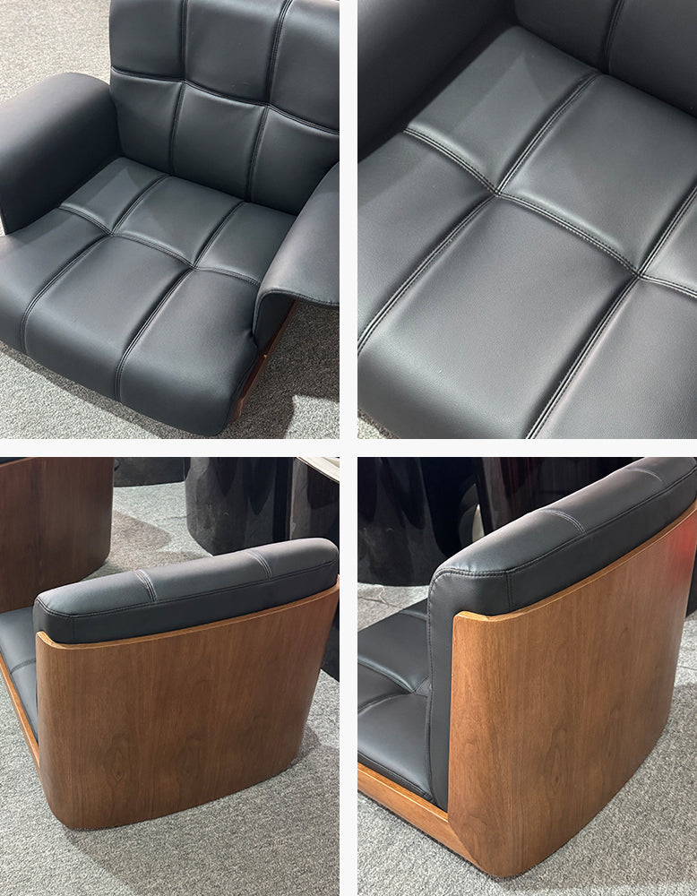 DC Concept Vasilev leather lounge armchair with a modern design, featuring a sleek, armless silhouette and plush upholstery.