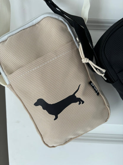 Dachshund sausage dog cross body bag with matching pouch and zipper, stylish accessory by The Bonnie Hound, featuring playful dog design.