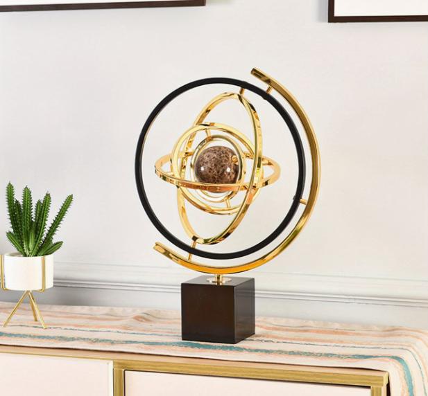 Abstract globe sculpture by TrendHomeDepot, featuring modern art design with elegant, flowing lines and a contemporary aesthetic.