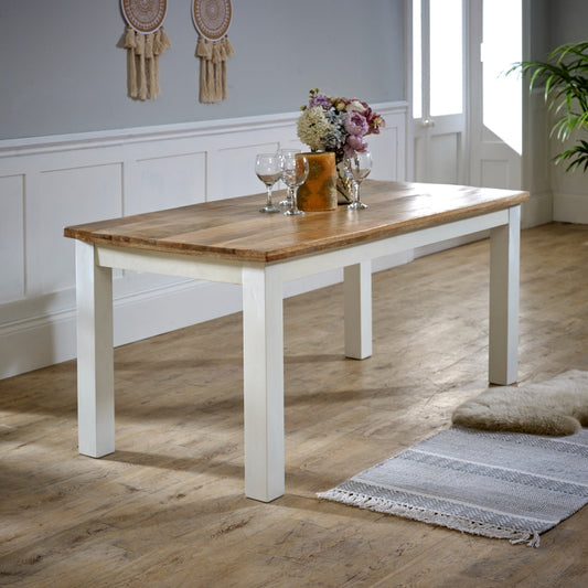 White dining table made of solid mango wood with clean design, perfect for kitchen and dining room by Verty Furniture.