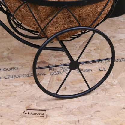 Vintage black metal bike garden planter by Maravi featuring a rustic, decorative bike design perfect for outdoor garden decor.