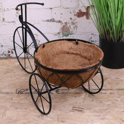 Vintage black metal bike garden planter by Maravi, featuring a rustic, garden-themed design perfect for outdoor decor.