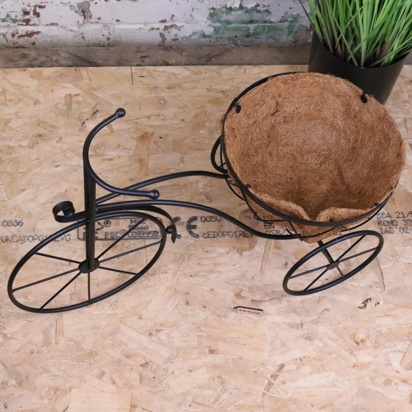 Black vintage metal bike garden planter by Maravi, featuring a charming retro design for outdoor garden decoration.