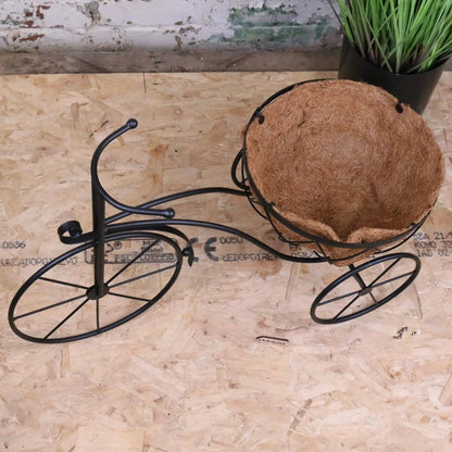 Black vintage metal bike garden planter by Maravi, featuring a charming retro design for outdoor garden decoration.