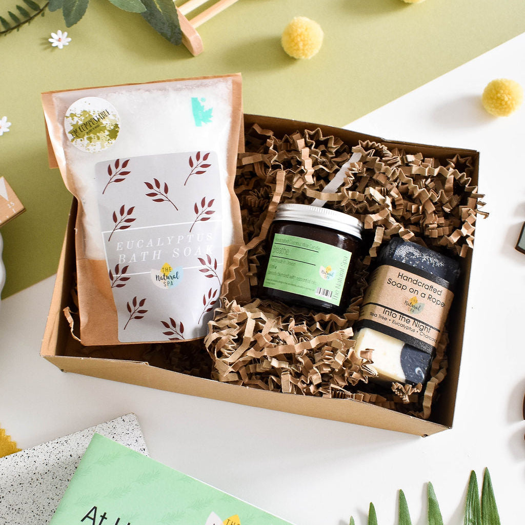 Natural spa set by thenaturalspa with candles, essential oils, and skincare products for a relaxing at-home spa experience