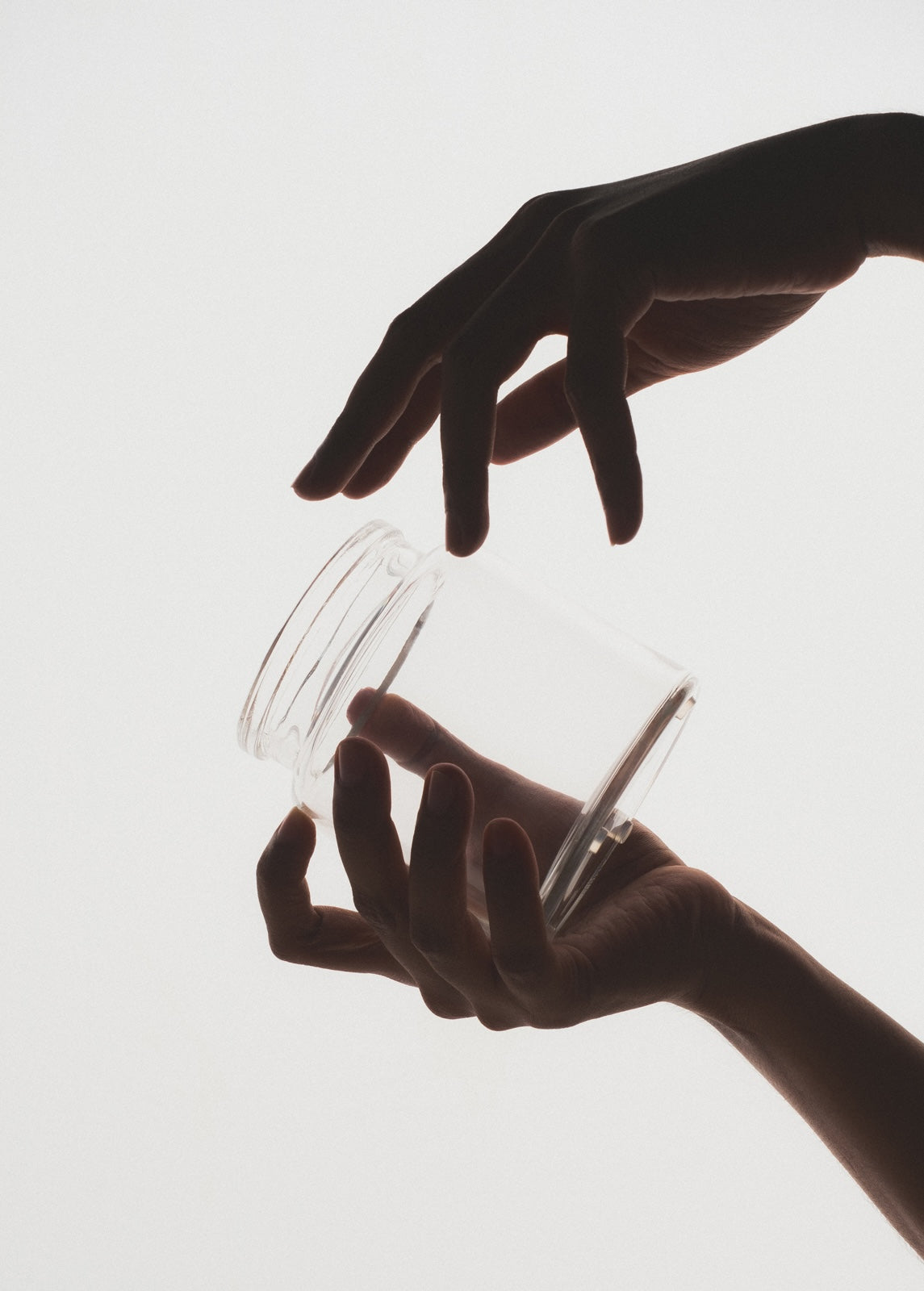 Clear glass bathroom storage jars by Kuishi, decorative bathroom decor for organizing and elevating your space.