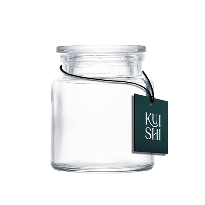 Small clear glass apothecary jar with a wide mouth, ideal for bathroom storage and decor by Kuishi