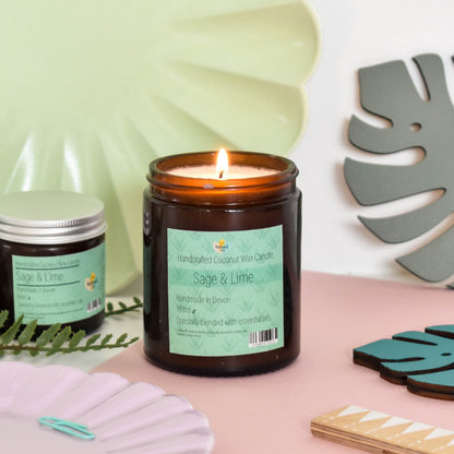 Sage and lime scented hand-poured coconut wax candle in two sizes, natural spa brand, showing the candle with a clean, minimalist design