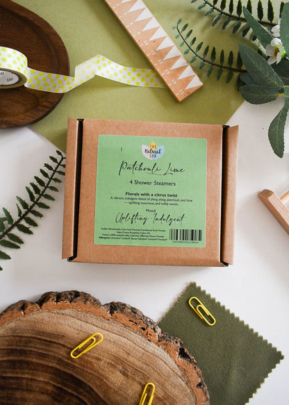 Set of four Patchouli Lime aromatherapy shower steamers by thenaturalspa with uplifting citrus and floral scent.