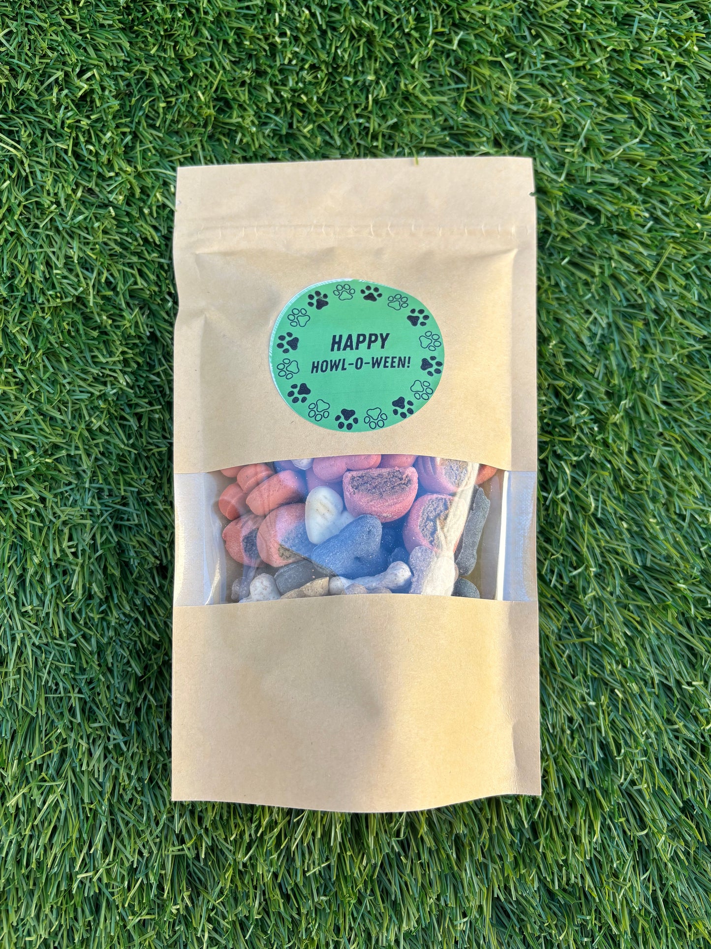 Assorted Happy Barkday Treat Pick n Mix chocolate treats in a 150g bag by The Bonnie Hound, featuring colorful packaging and variety of chocolates.
