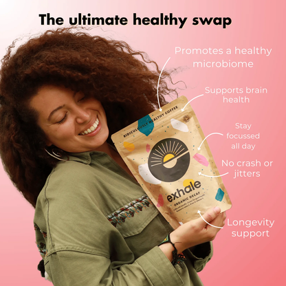 Organic dark roast coffee from Exhale Healthy Coffee, featuring rich coffee beans in a natural setting.