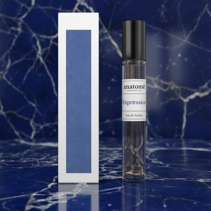 Anatomē Expression Functional perfume travel bottle, 10ml, elegant glass container with a sleek design and minimalist label.