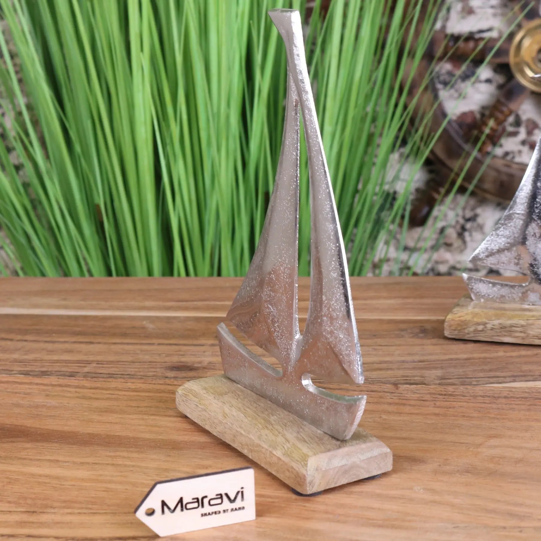 Maravi Mandvi sailing boat ornament model featuring detailed miniature boat with sails, perfect as a decorative ornament.