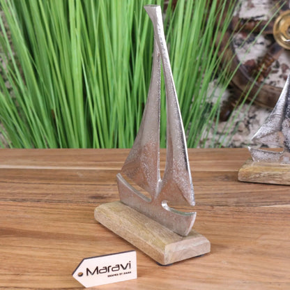 Maravi Mandvi sailing boat ornament model featuring detailed miniature boat with sails, perfect as a decorative ornament.