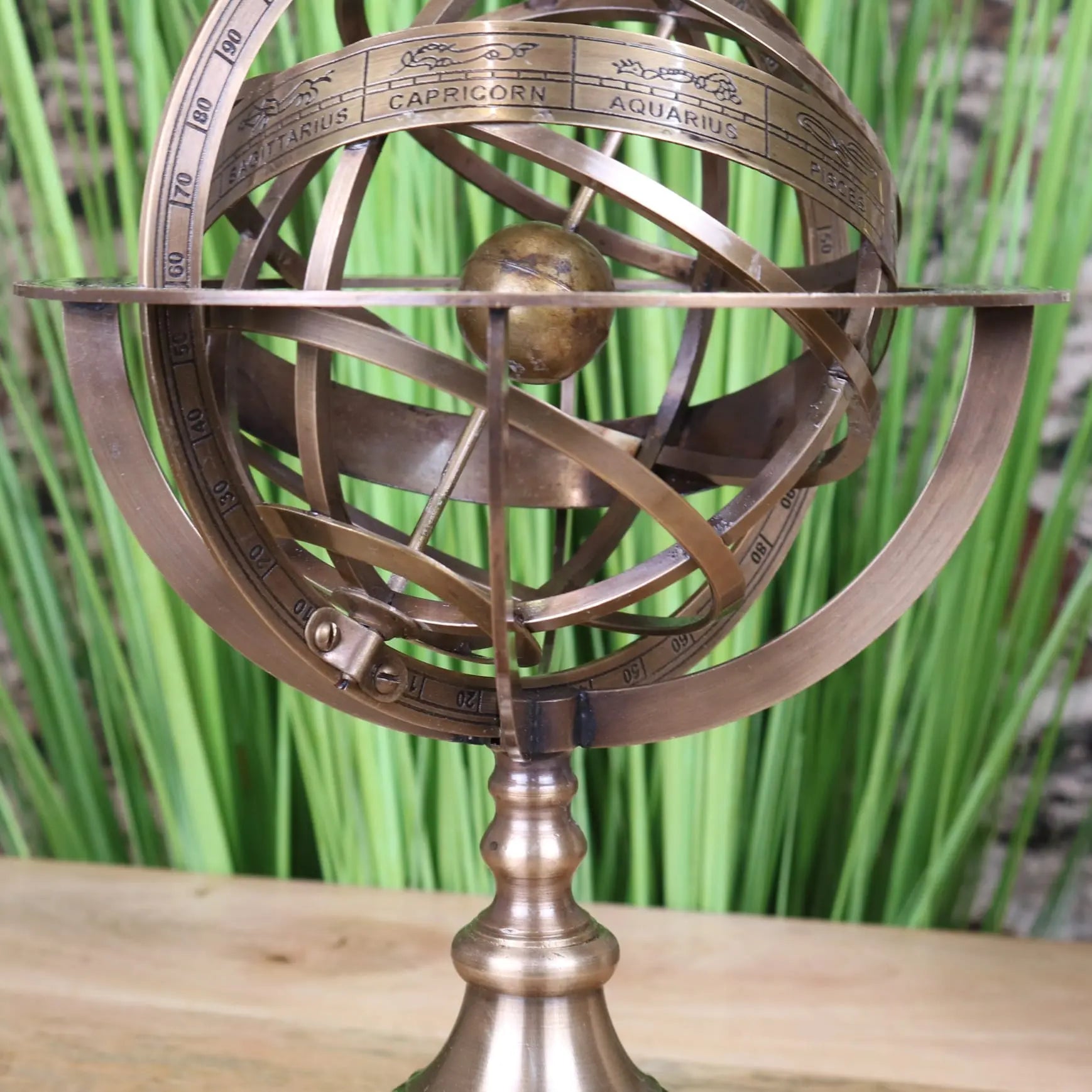 Large brass armillary sphere ornament by Maravi, 30cm desk accessory with intricate rings and celestial design.
