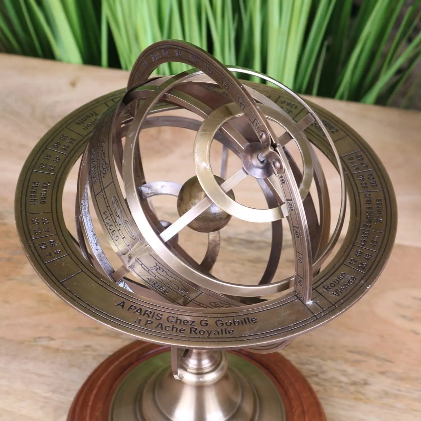 Large brass armillary sphere ornament on desk, 30cm, by Maravi, decorative brass desk accessory with intricate globe design.