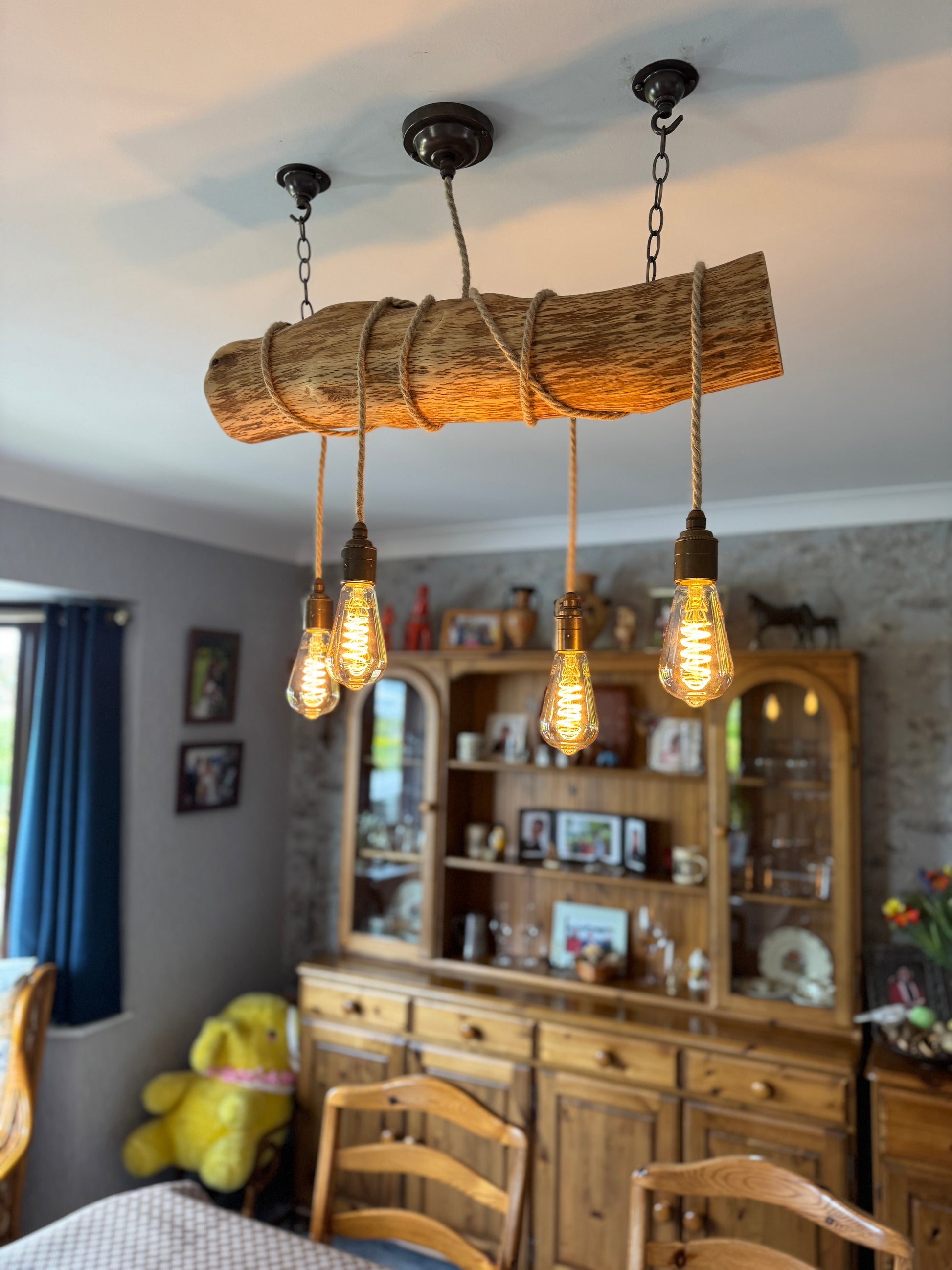 Rustic Oak Wrap Around Chandelier by MooBoo Home featuring warm wood tones and elegant design for ambient lighting.
