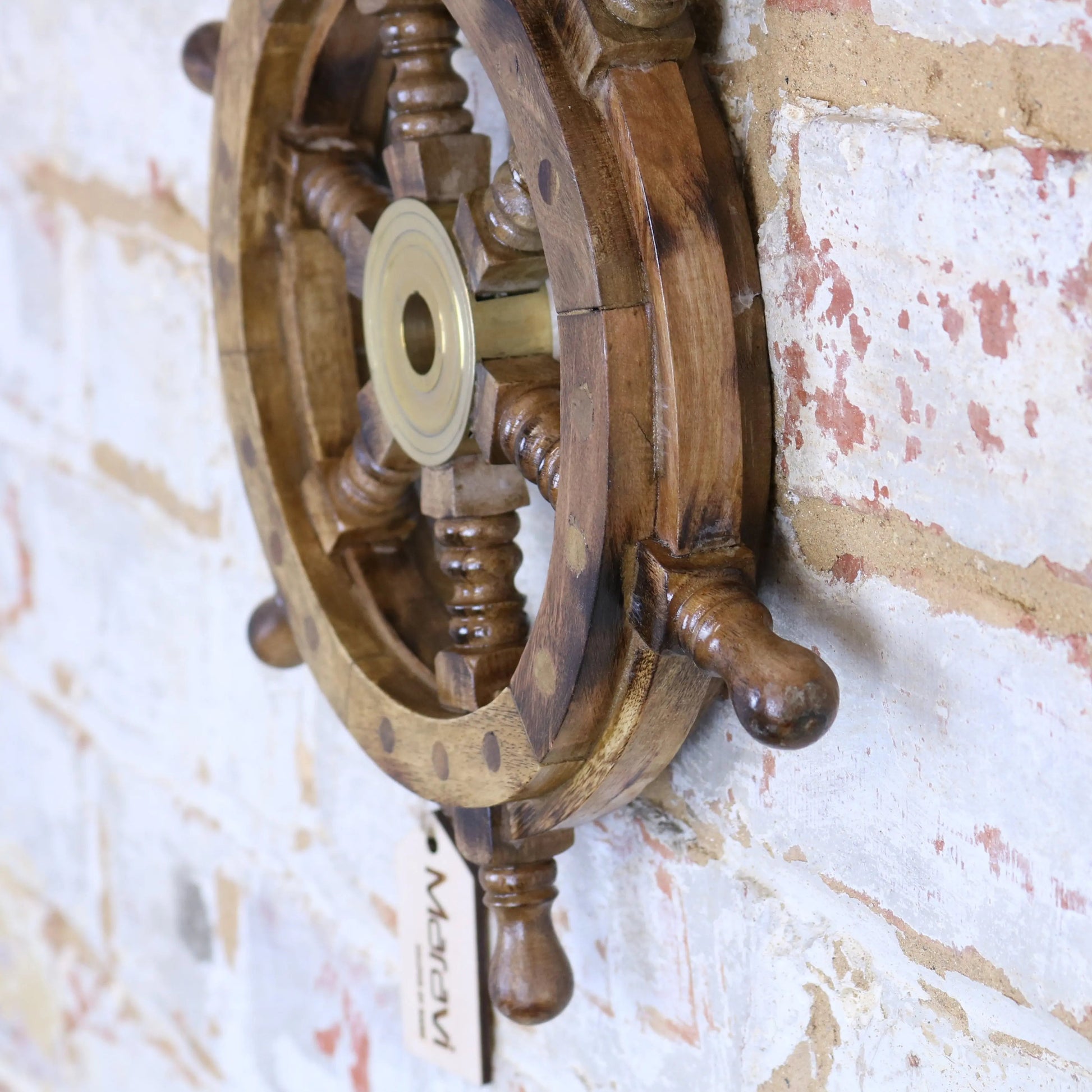 Maravi Naav wooden ships wheel ornament in natural wood finish, decorative nautical decor for home or maritime themed spaces.