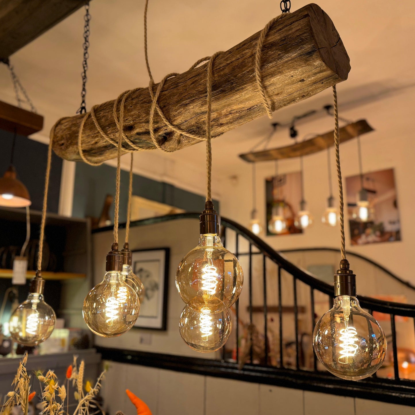 Rustic Oak Wrap Around Chandelier by MooBoo Home featuring warm wood tones and elegant wrap-around design.