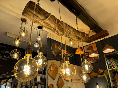 Rustic oak wrap-around chandelier by MooBoo Home featuring warm wooden detailing and elegant design for ambient lighting.