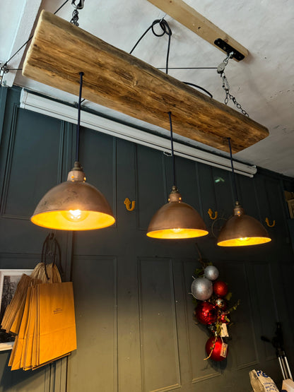 Wooden beam light with shades from MooBoo Home, 120cm long, featuring a rustic wooden beam and fabric shades for warm lighting.