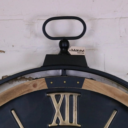 Industrial extra large black and gold cog wall clock by Maravi, featuring a vintage industrial design with bold gear details.