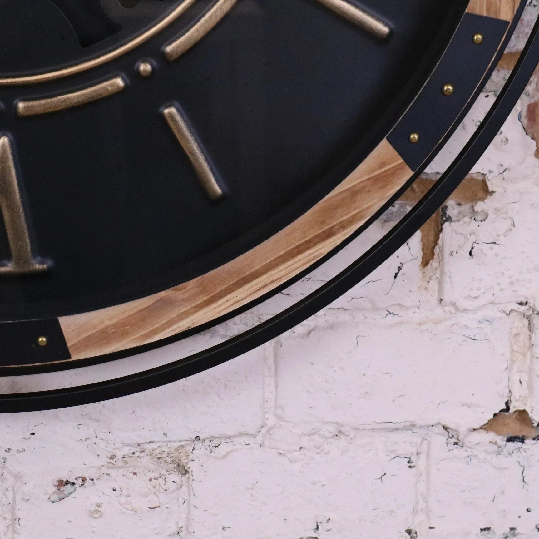 Industrial extra large cog wall clock in black and gold with a vintage industrial design by Maravi.
