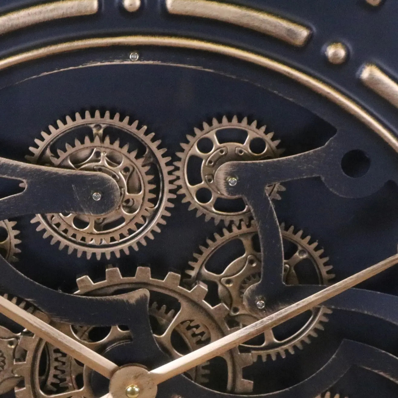 Industrial extra large cog wall clock in black and gold by Maravi, featuring a vintage mechanical design.