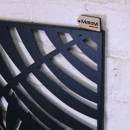 Black metal wall art featuring a leaf design by Maravi, showcasing intricate leaf shapes and a modern, artistic wall decor piece.