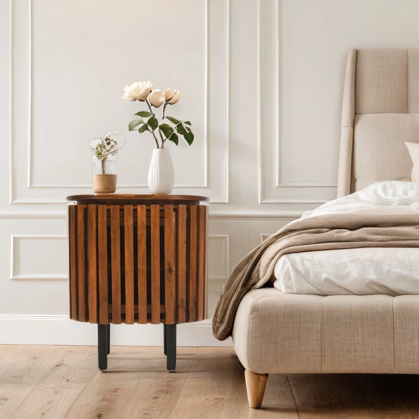 Verty Furniture Compton mango wood bedside table with sleek design, shown in a stylish bedroom setting.