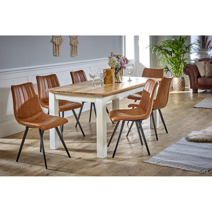 White dining table made of solid mango wood with a modern design from Verty Furniture, perfect for kitchen and dining rooms.
