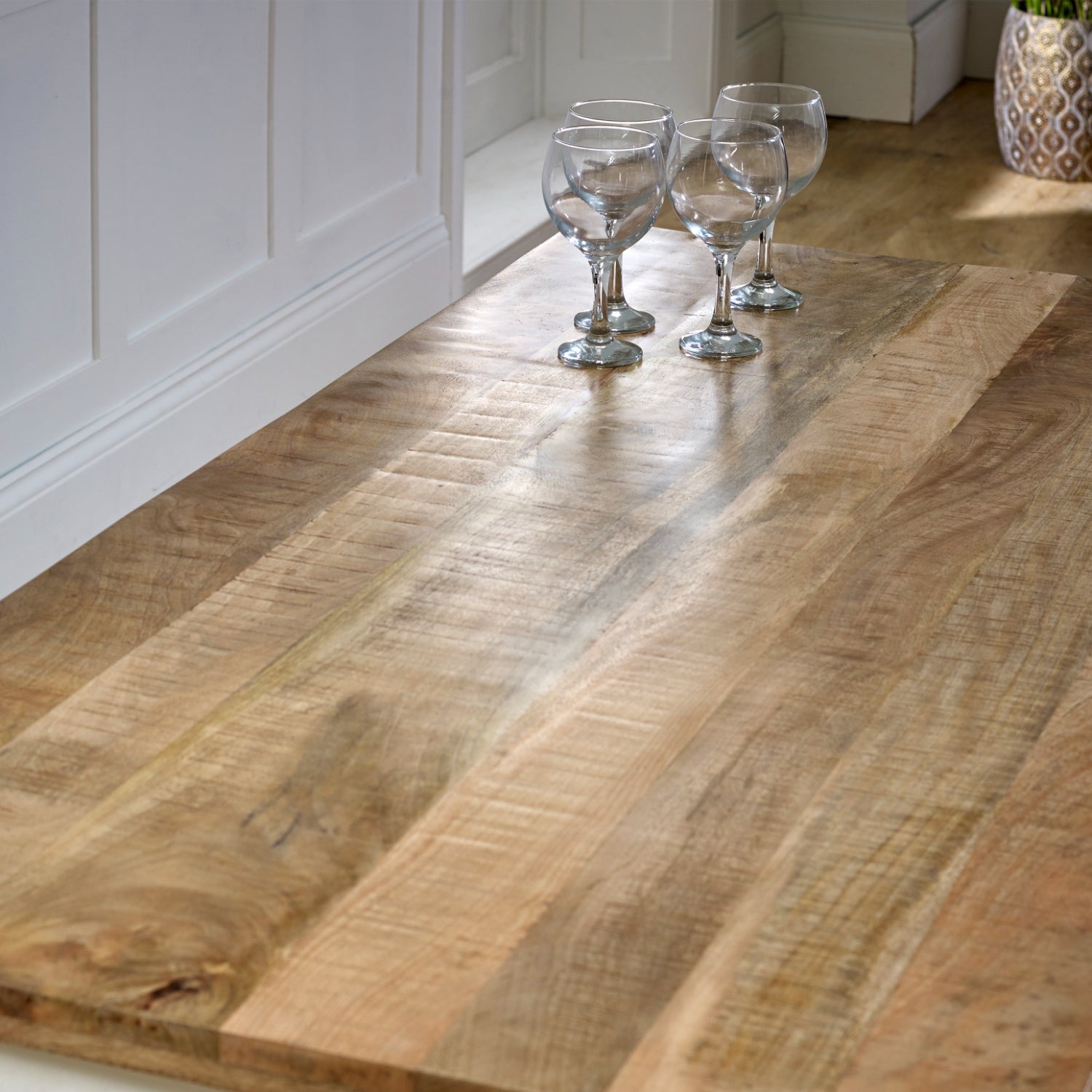 Solid white mango wood dining table by Verty Furniture, showcasing a sleek and sturdy kitchen and dining room table design.
