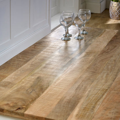 Solid white mango wood dining table by Verty Furniture, showcasing a sleek and sturdy kitchen and dining room table design.
