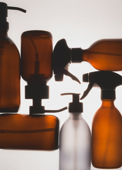 Grey Kuishi soap dispenser from the Mixed Amber Glass Collection, featuring a sleek pump design for liquid soap.