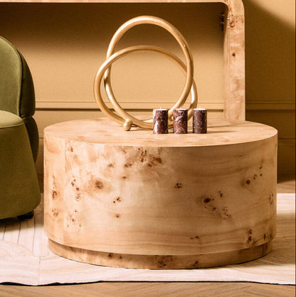 Natural burl wood round coffee table with drum shape design by Orsina, showcasing smooth wood grain and modern style.