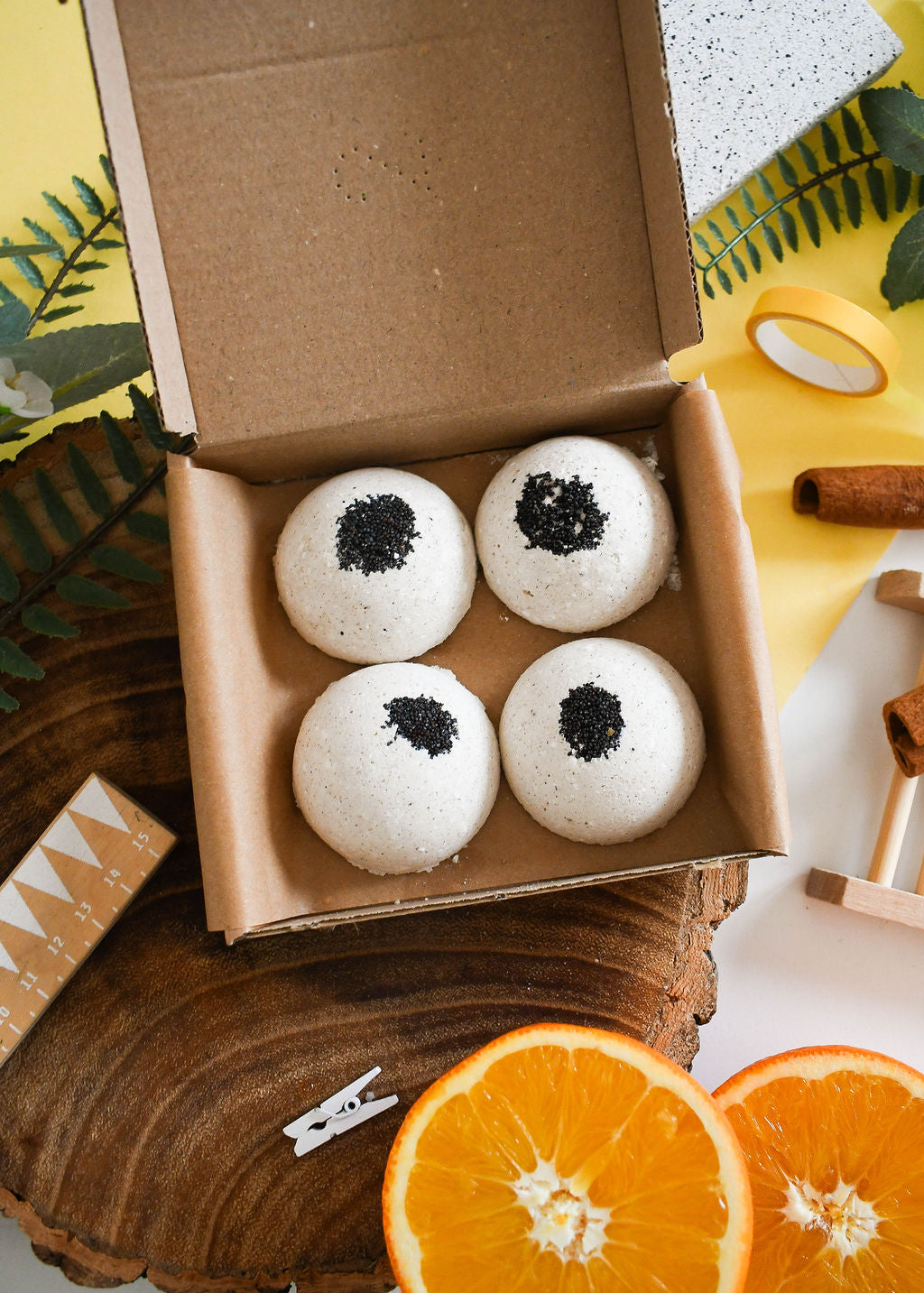 Set of four Orange Masala aromatherapy shower steamers with spiced citrus and cardamom for relaxing steam showers from thenaturalspa.