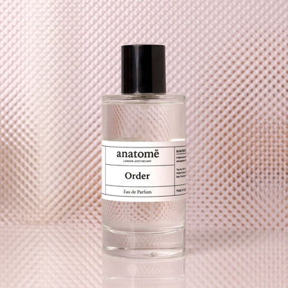 Travel-sized anatomē Anatome functional perfume bottle with a sleek 10ml glass container and minimalist design.
