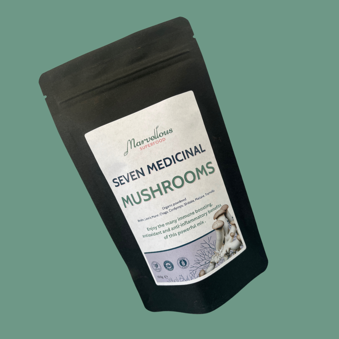 Organic 7 Mushroom Blend by marvelloussuperfood, featuring a mix of mushrooms in a glass jar for daily wellness support.