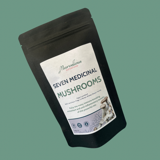 Organic 7 Mushroom Blend by marvelloussuperfood, featuring a mix of mushrooms in a glass jar for daily wellness support.