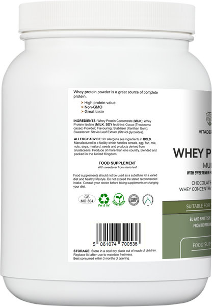 Vitadefence whey protein multi in chocolate flavor, 600g food supplement with Stevia, shown in round jar with label and scoop