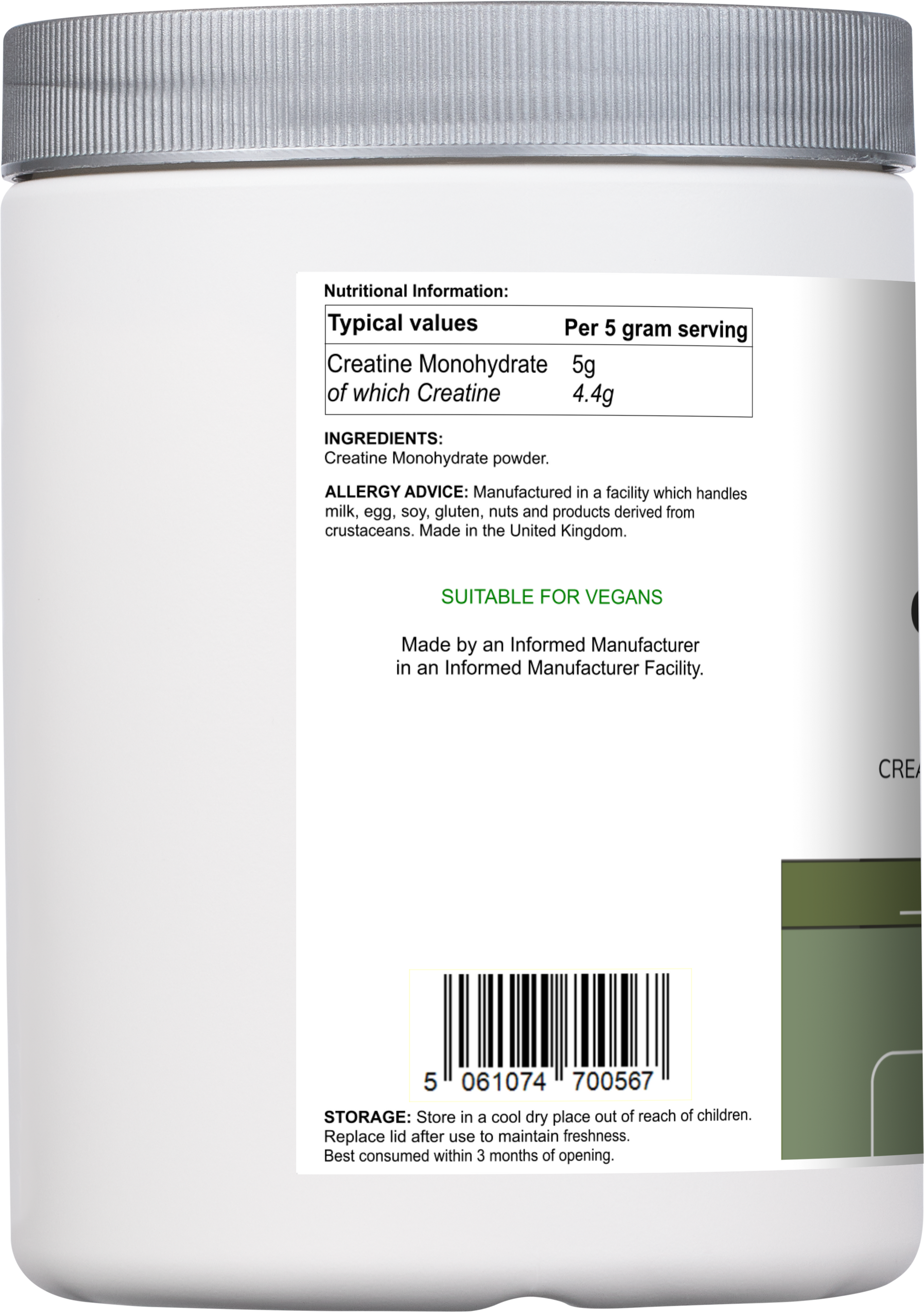 Vitadefence® Creatine Monohydrate powder in a 500g round silver container, side view showing the unflavored dietary supplement.