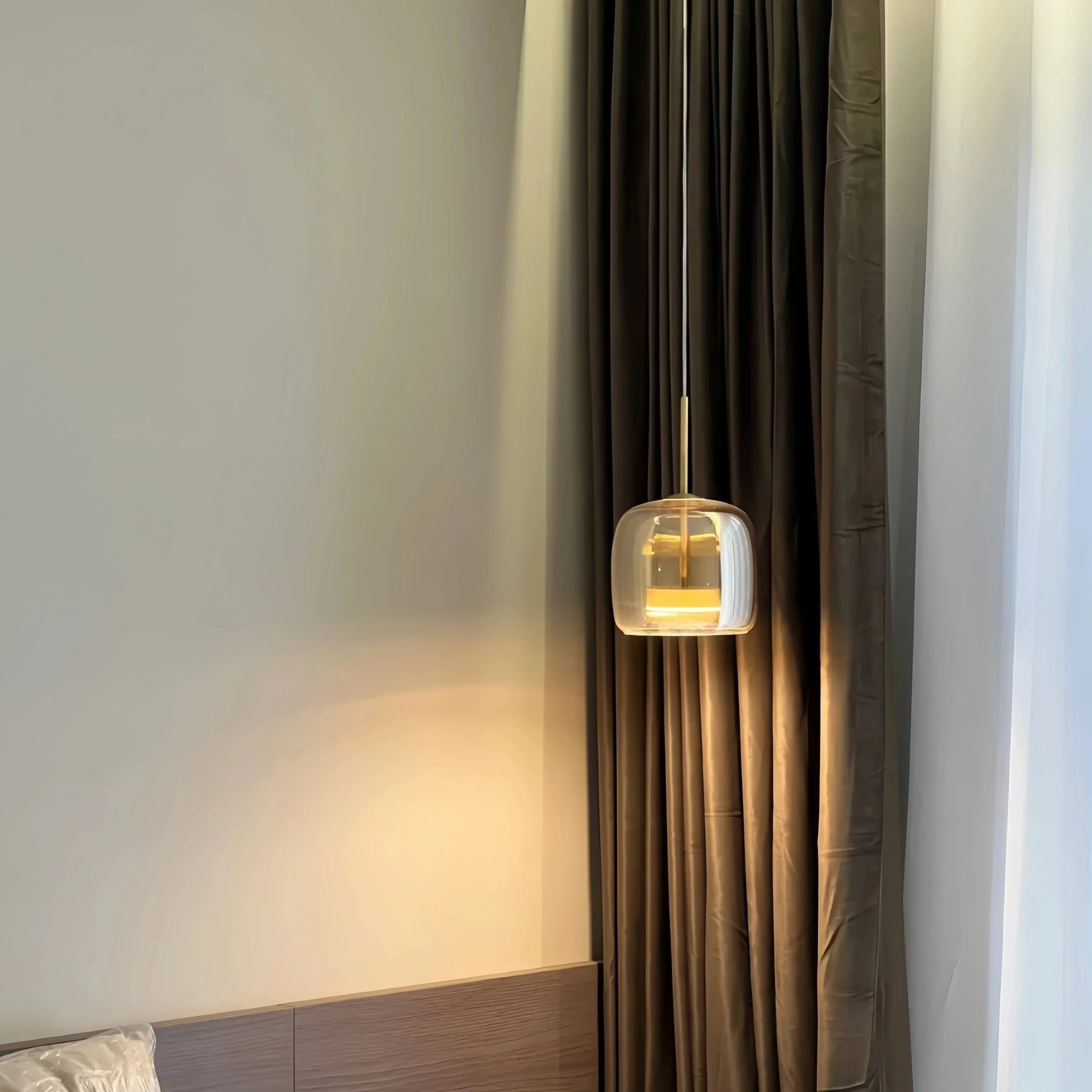Black and gold pendant lamp by Light My House with LED warm light and adjustable height for modern interior lighting.