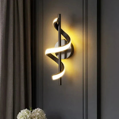 Twisted LED wall light in black and gold finishes, modern design ideal for living room decor by Light My House.