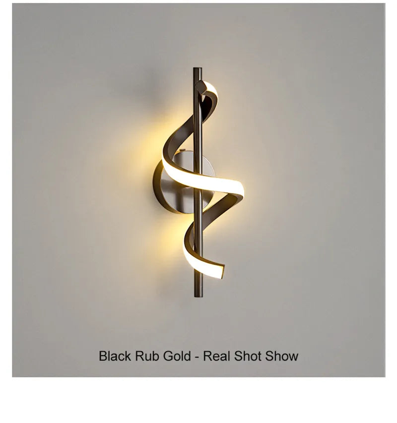 Twisted LED wall light in black and gold by Light My House, modern design for living room wall decor.