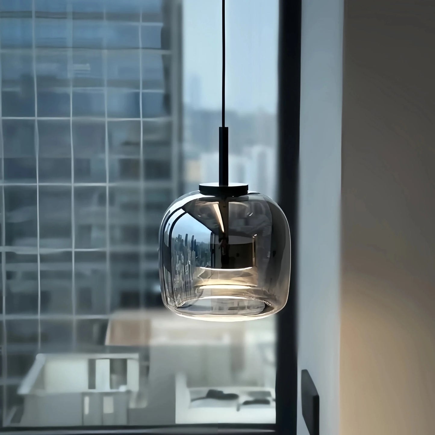 Black gold pendant lamp by Light My House featuring LED warm light and adjustable height for modern interior lighting.
